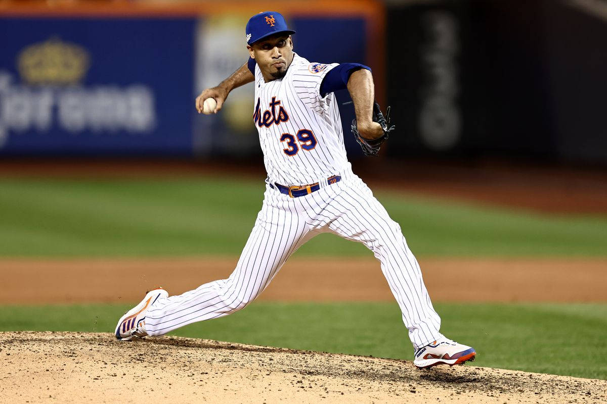 Edwin Diaz Throwing Baseball On Field Background