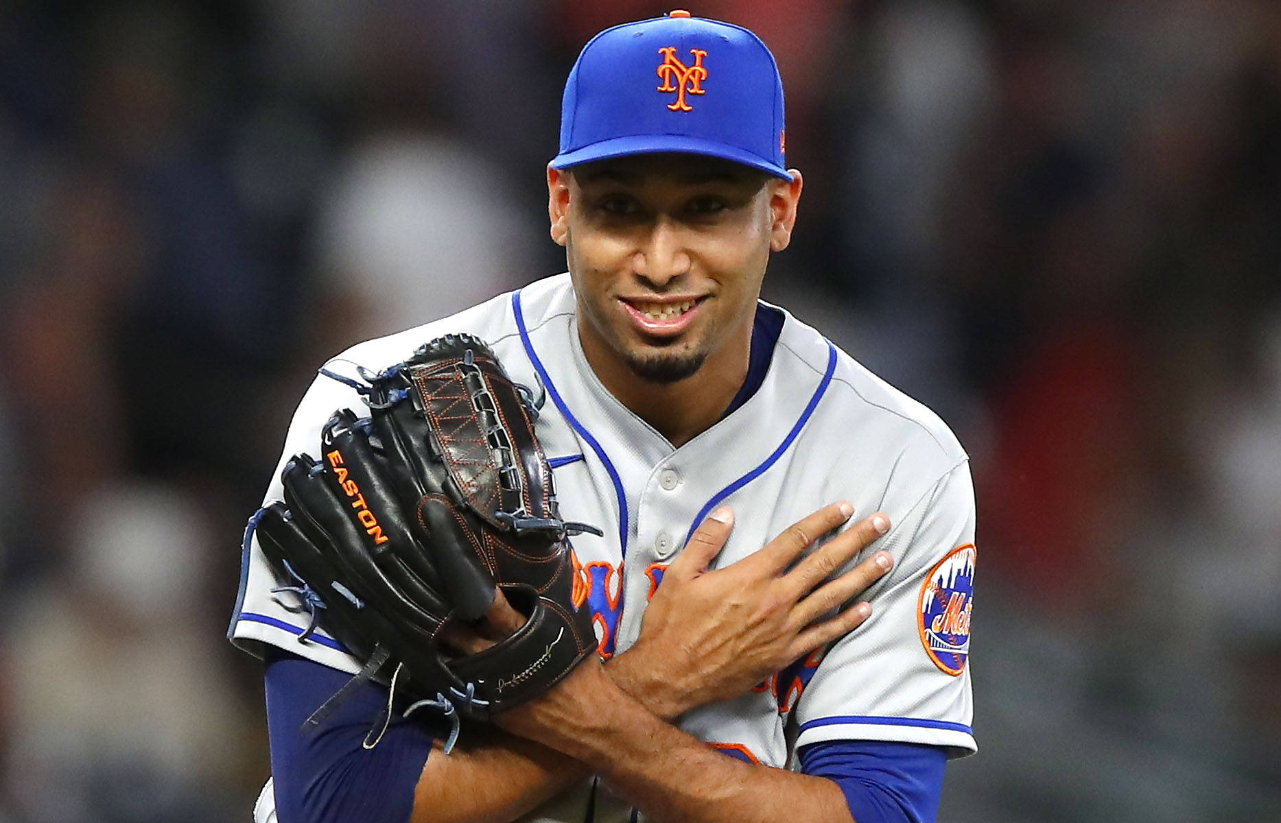 Edwin Diaz With Hands To Chest Background