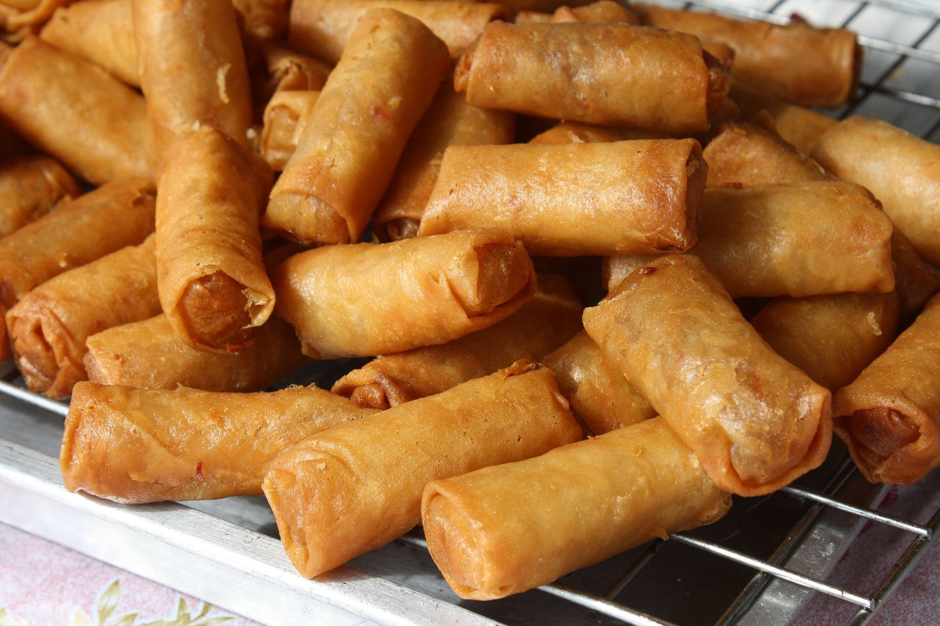 Egg Rolls On Wire Rack Background