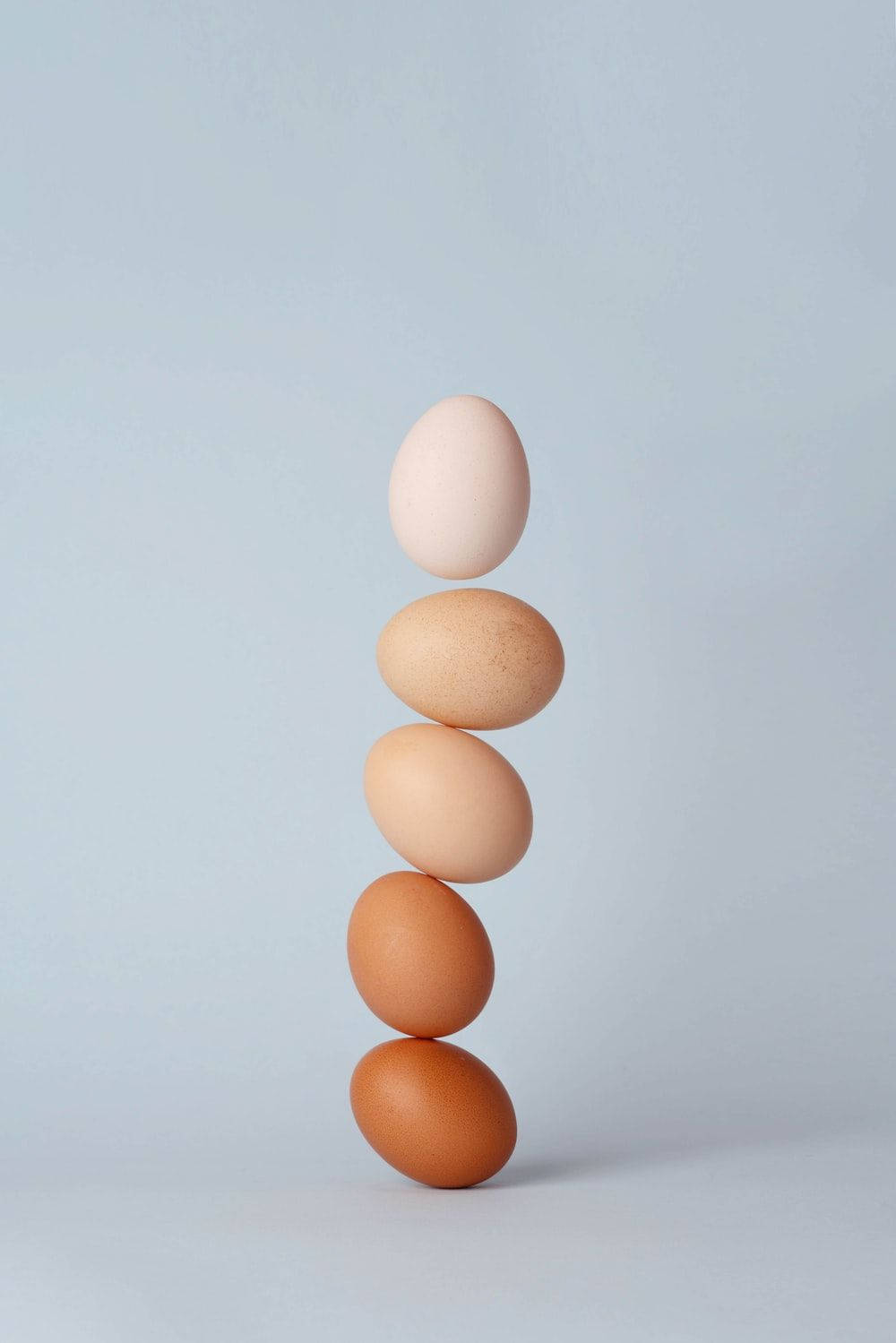 Eggs Balanced On Each Other Background