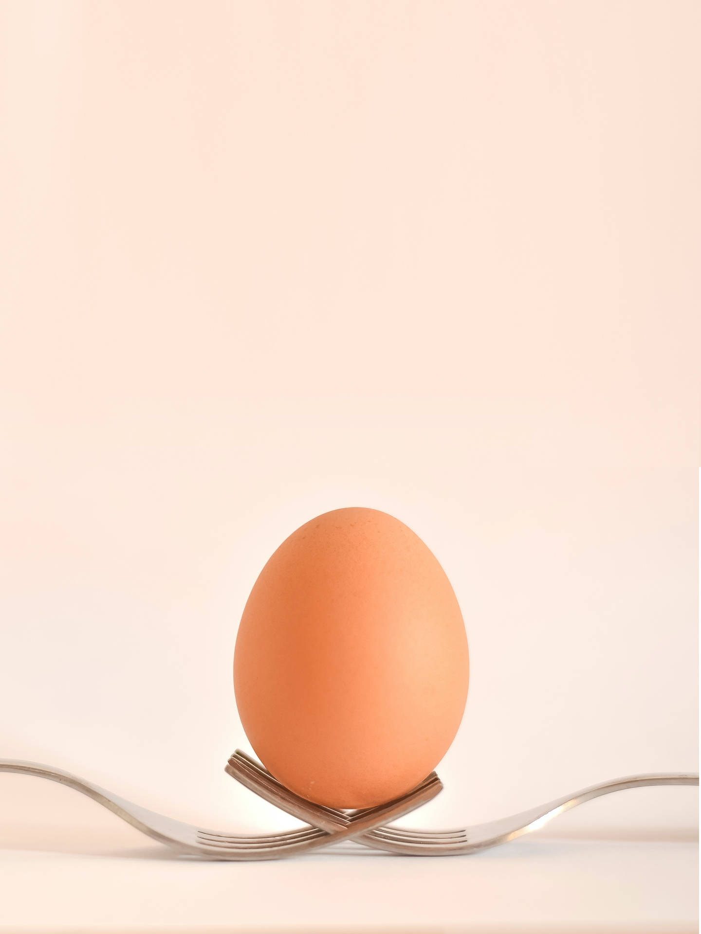 Eggs On Peach Background