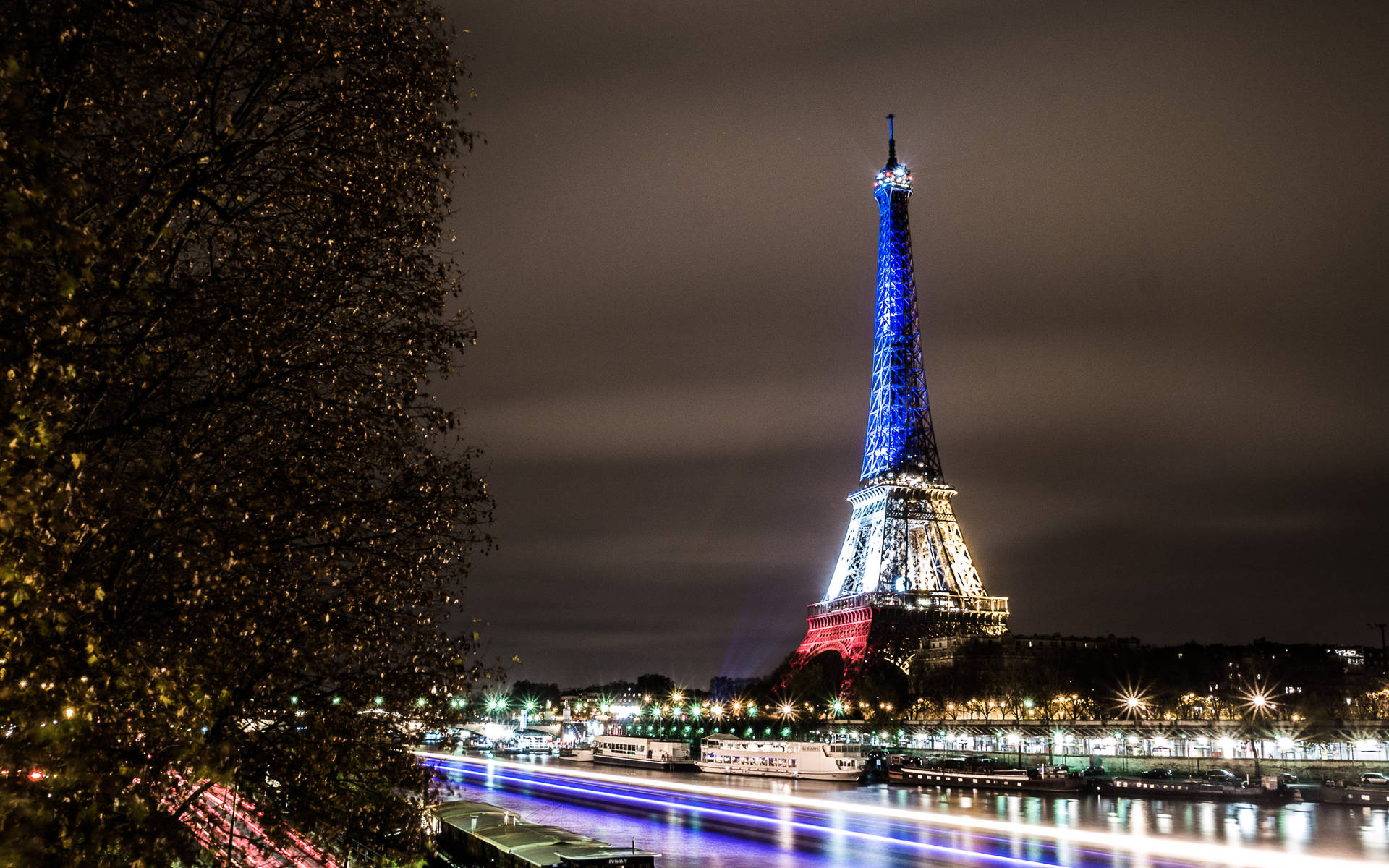 Eiffel Lights And France Flag Background