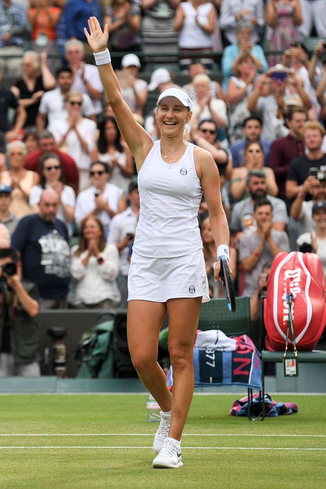 Ekaterina Makarova Walking And Waving Background