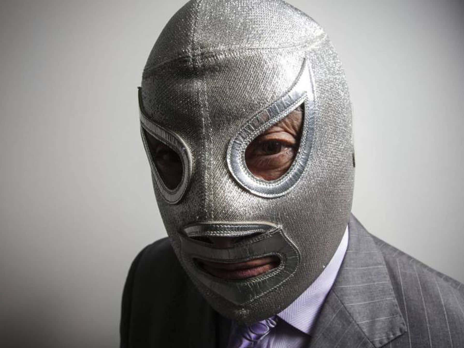 El Hijo Del Santo On El Santo Mask Background