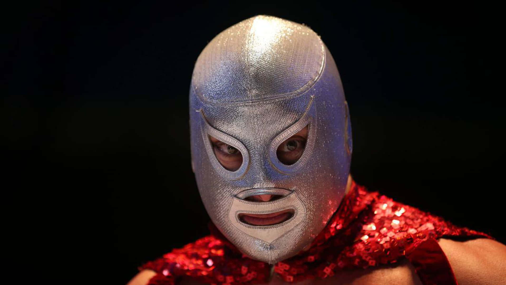 El Santo Mask On His Son Background