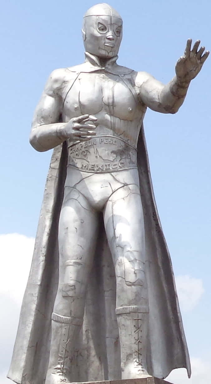 El Santo Silver Statue Background