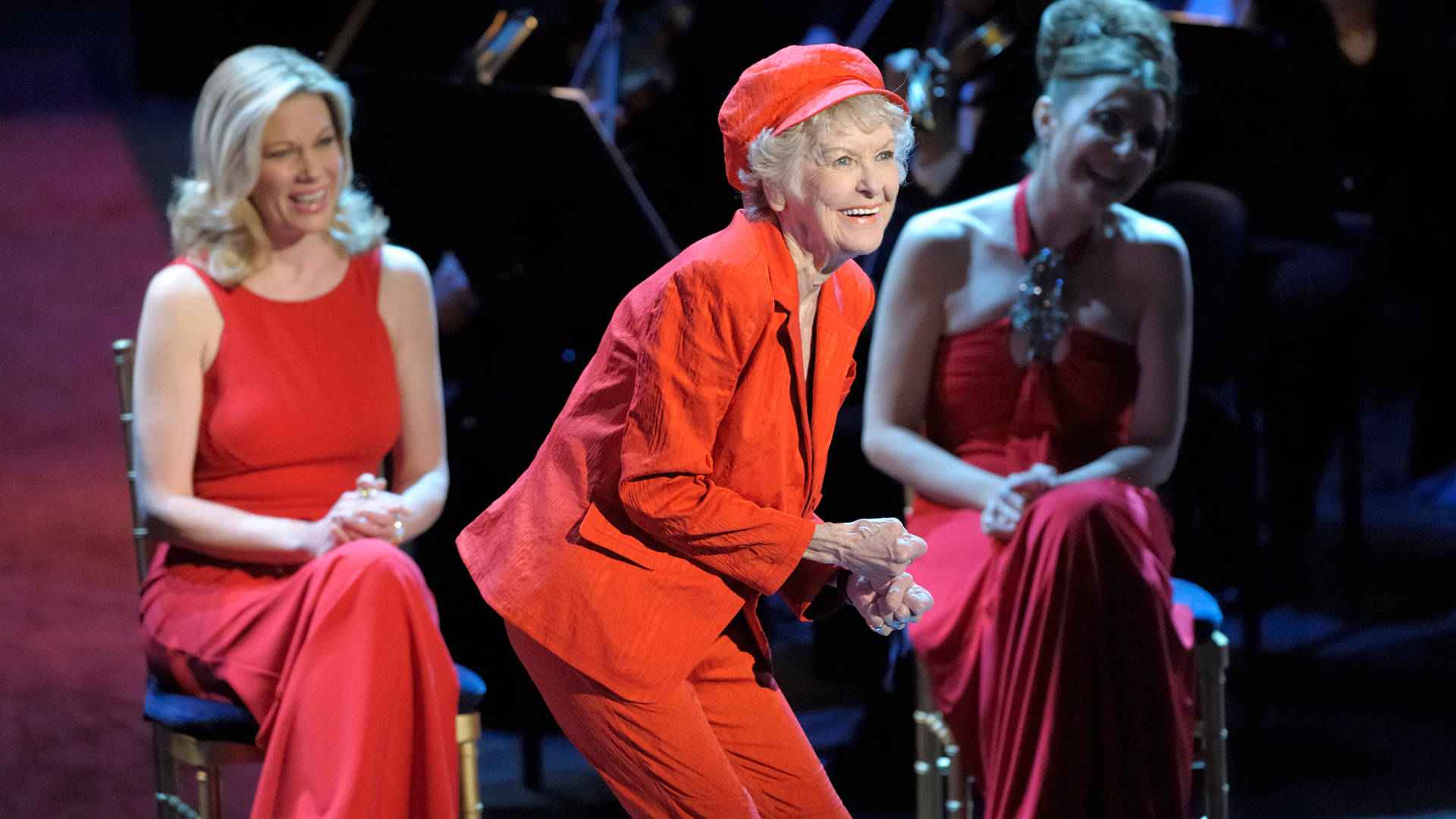 Elaine Stritch Acting On Stage In Red Background