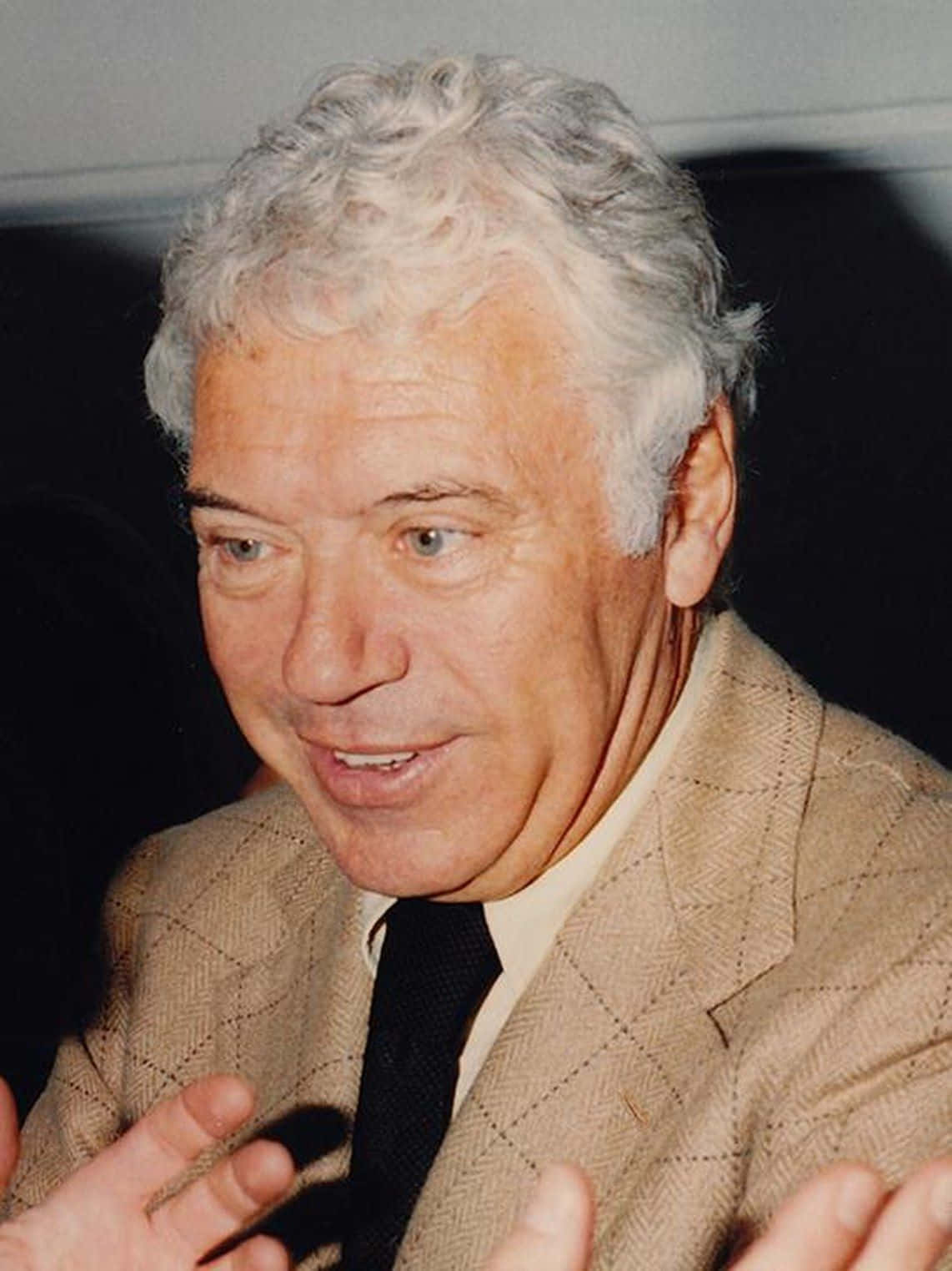 Elderly Gentleman Speaking Candid Background