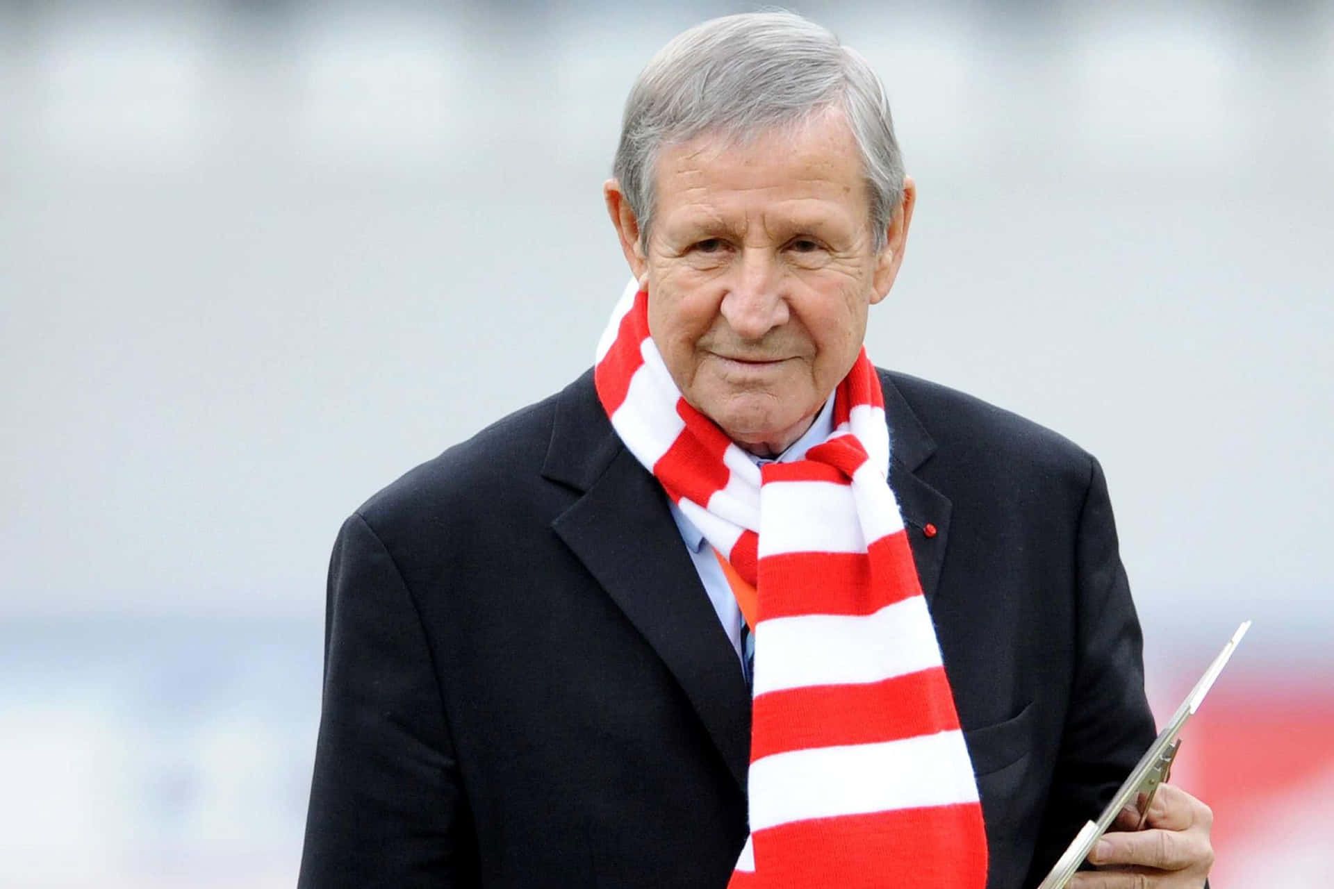 Elderly Gentlemanwith Striped Scarf Background