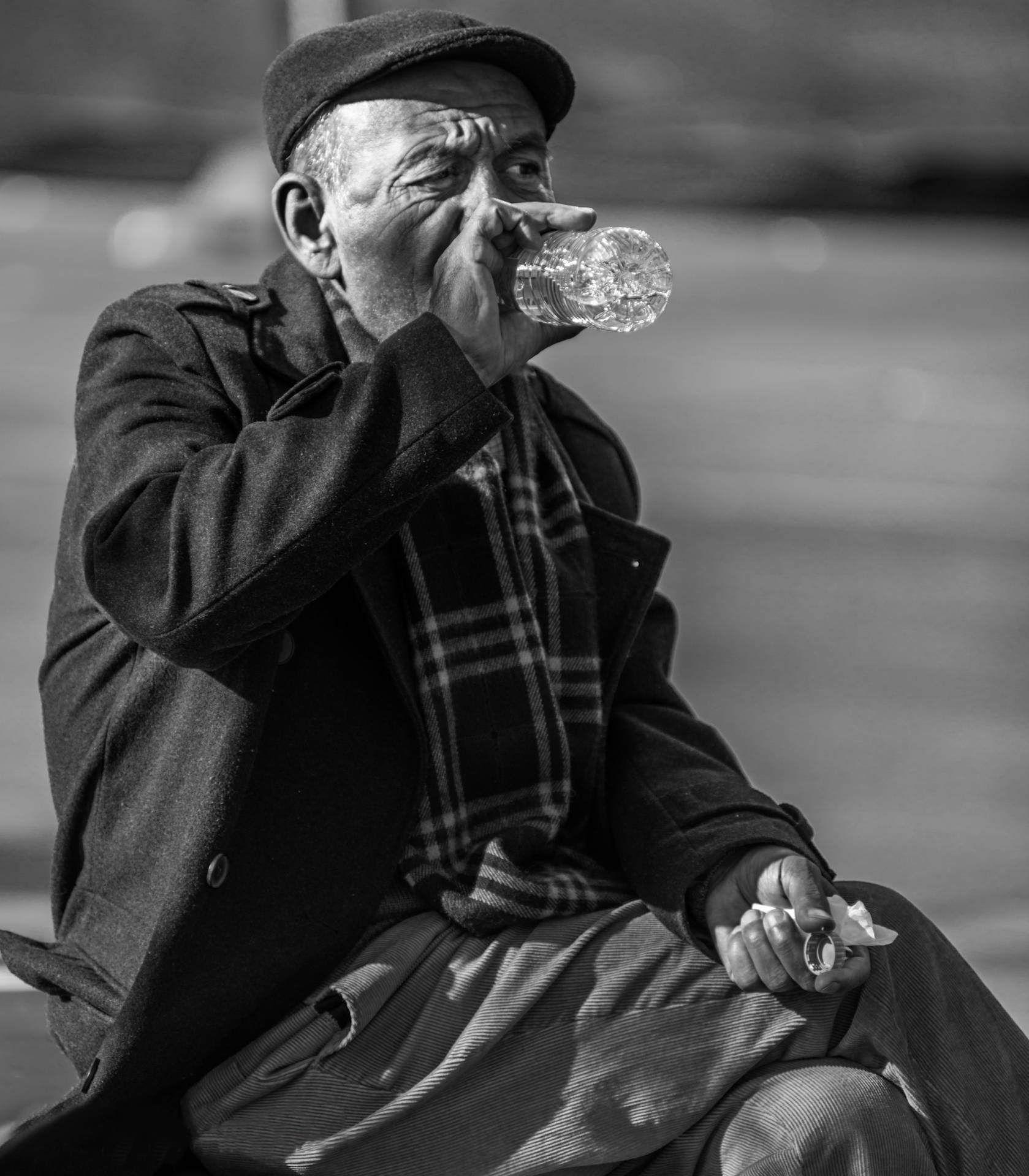 Elderly Man Enjoying Fresh Drinking Water Background