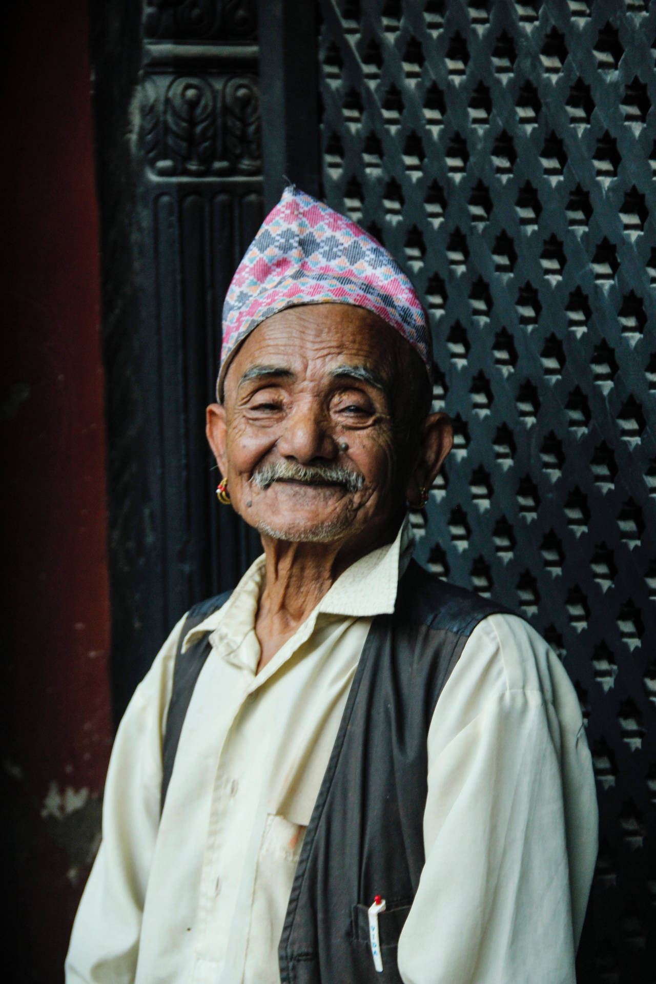 Elderly Man Rejoicing In Traditional Keffiyeh Head Scarf Background