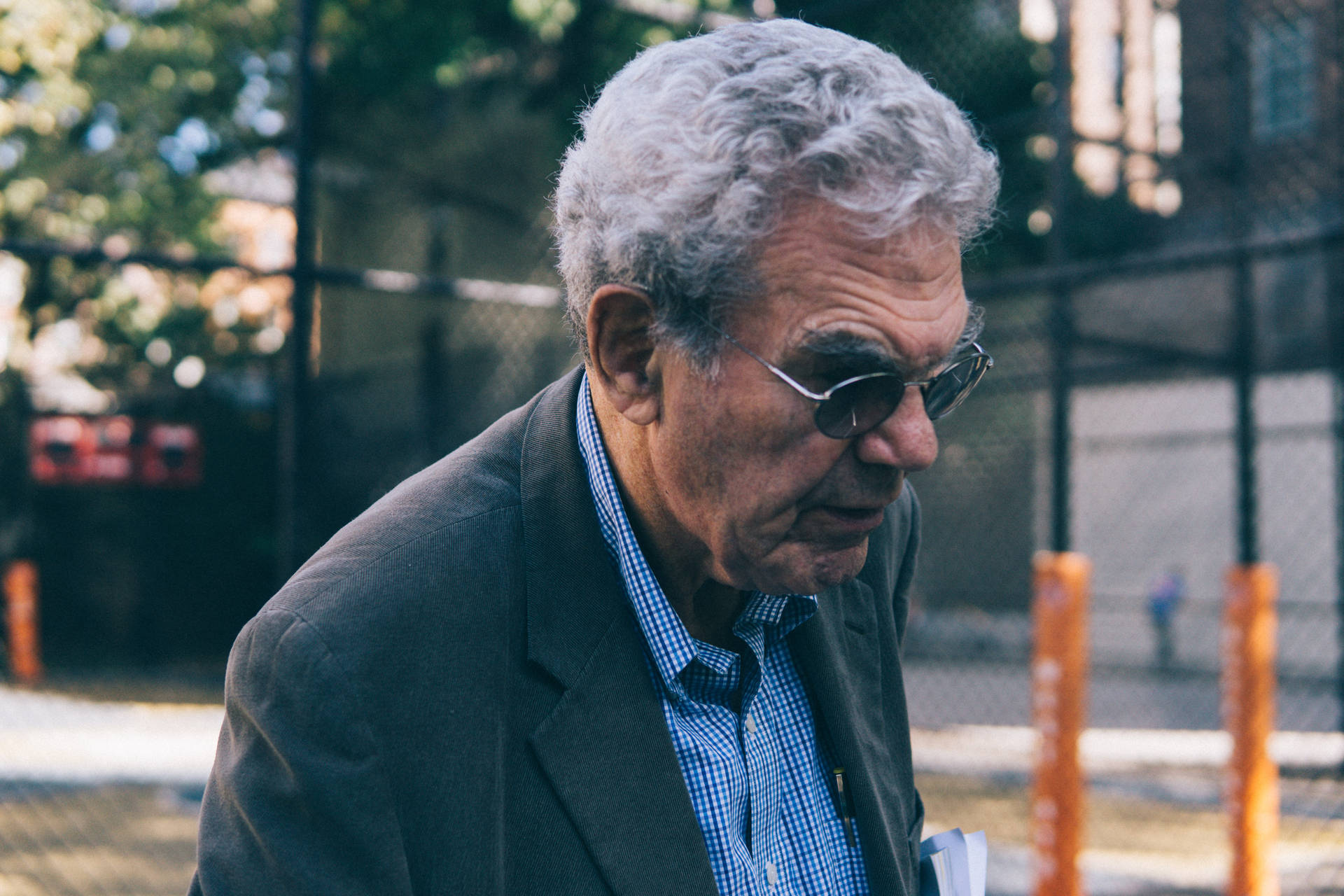 Elderly Man With Sunglasses And Gray Hair