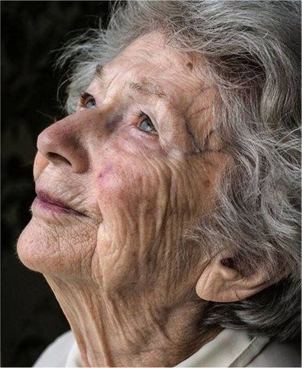 Elderly Woman Looking Up Background