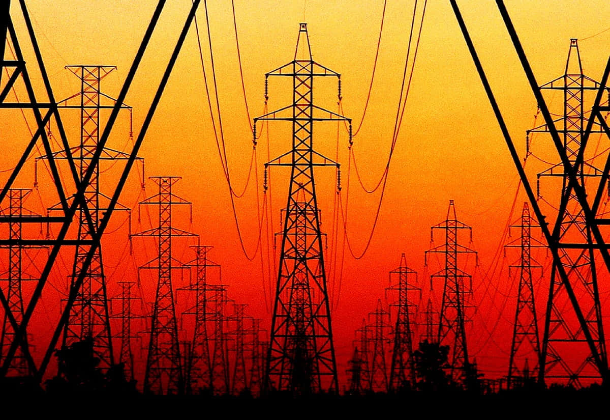 Electric Posts And Sunset Background