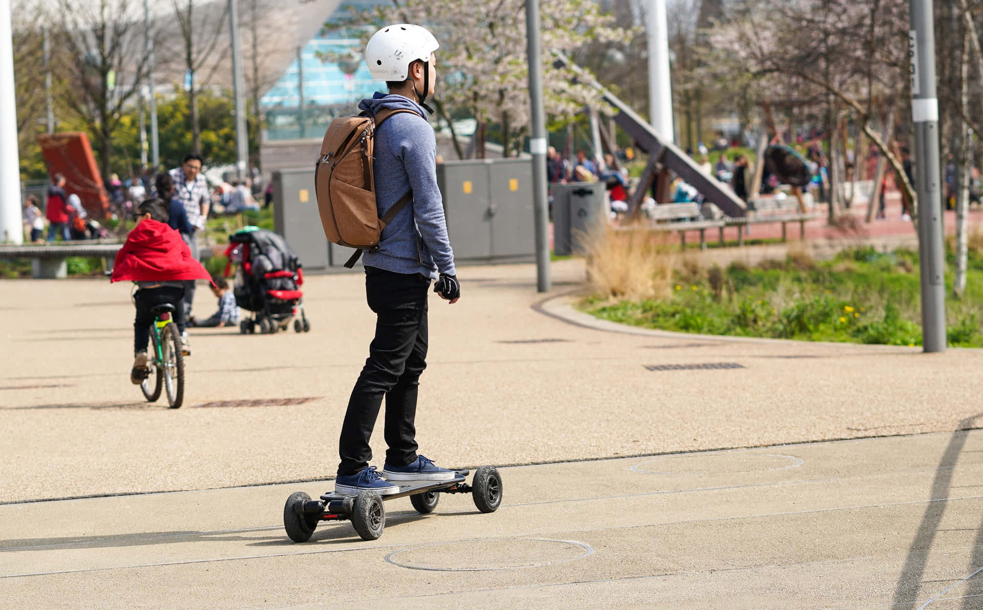 Electric Skateboard Riderin Park Background