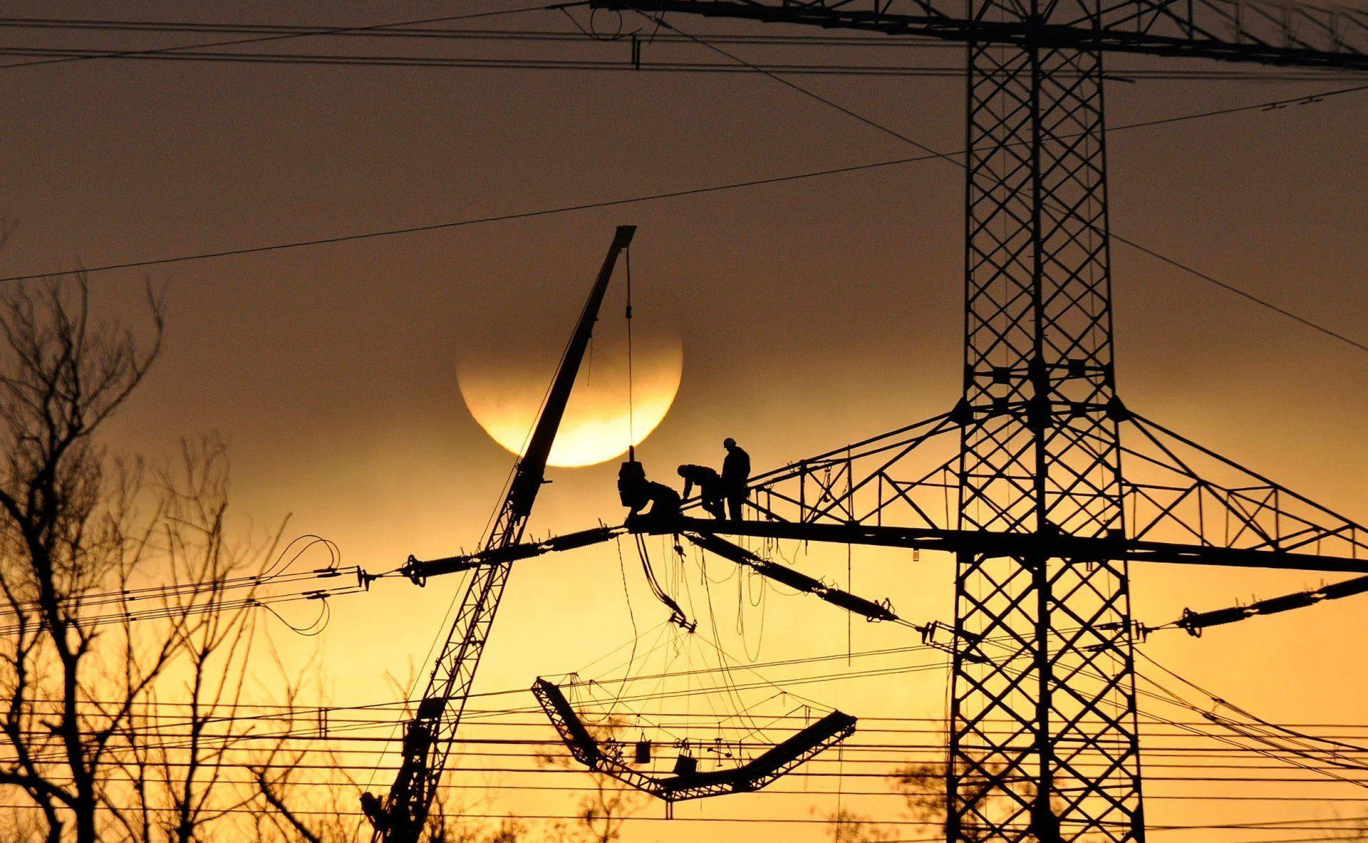 Electricians On A Pylon Electric Tower