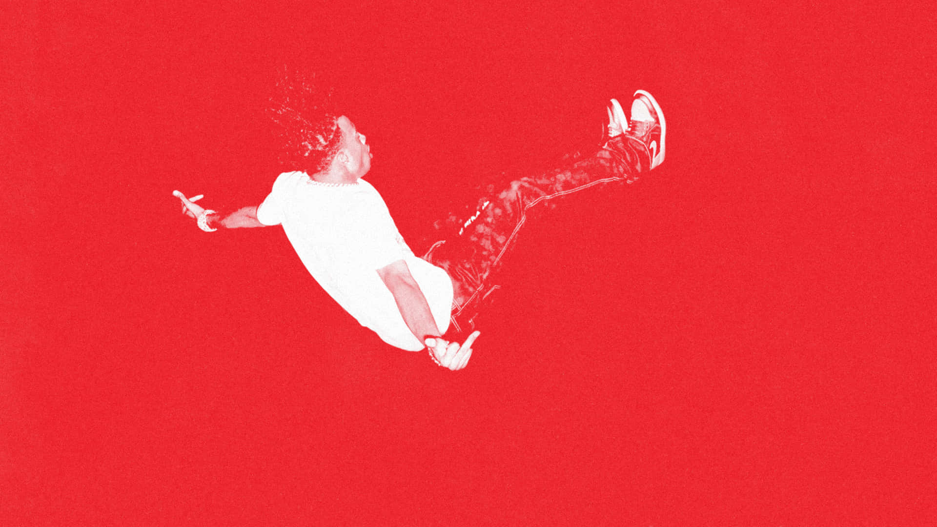 Electrifying Action - Carti In Mid-air Background