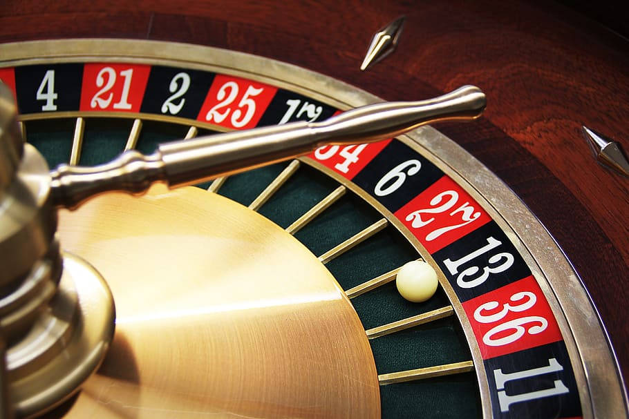 Elegance Of Chance - A Close-up View Of A Roulette Wheel Background