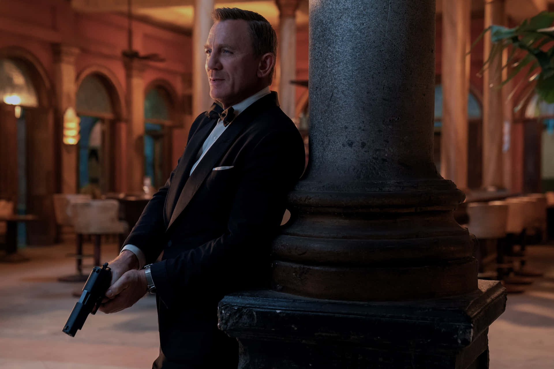Elegant Agent With Gun Background
