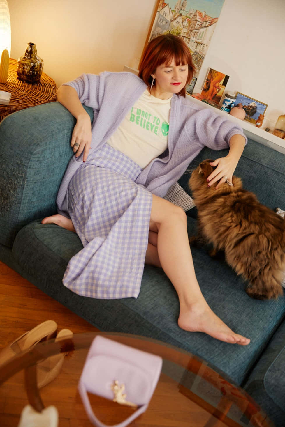 Elegant Amélie Pichard Relaxing On A Couch