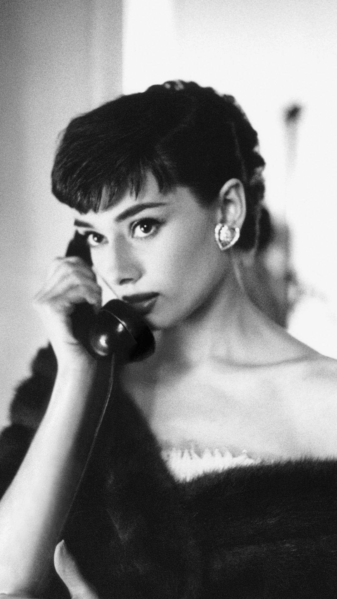 Elegant Audrey Hepburn Background