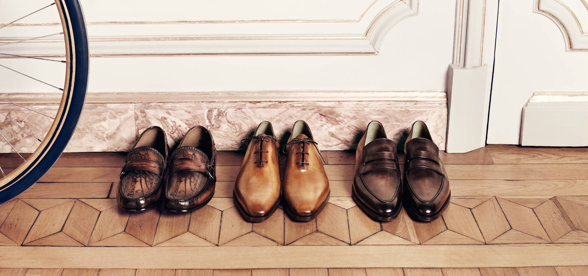 Elegant Berluti Men's Shoes On Display Background