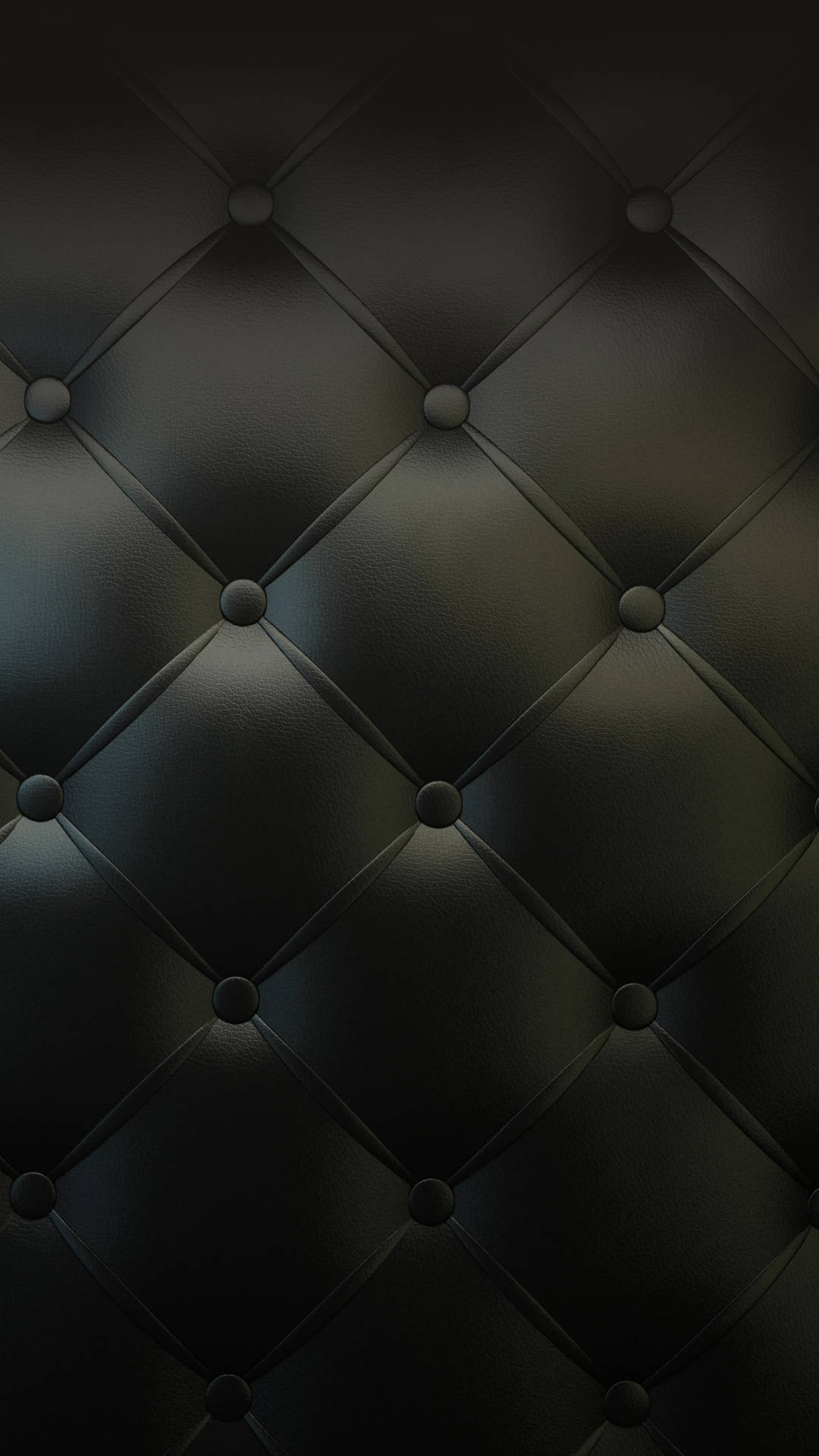 Elegant Black Iphone Against Leather Upholstery Background
