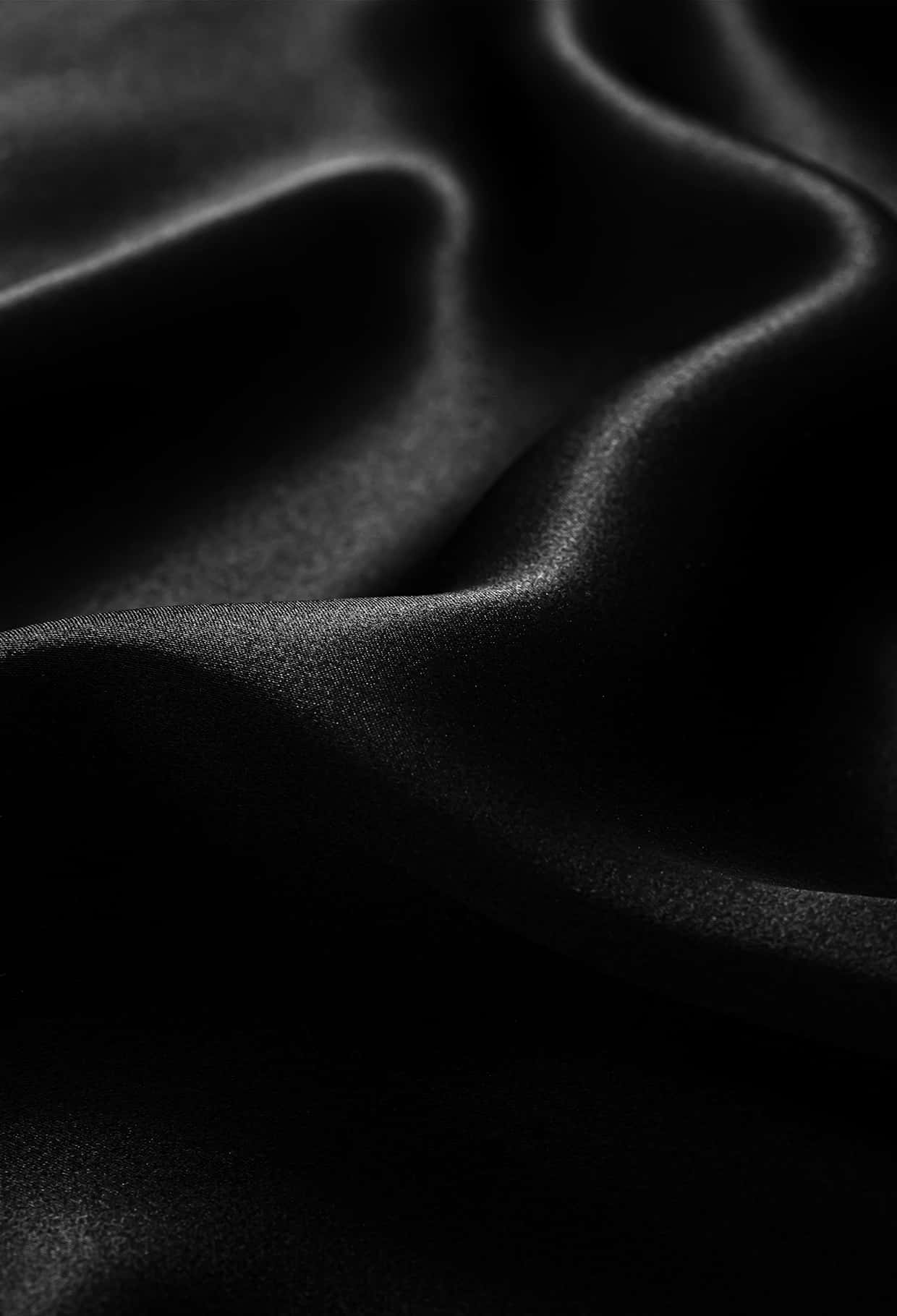 Elegant Black Silk Texture Background