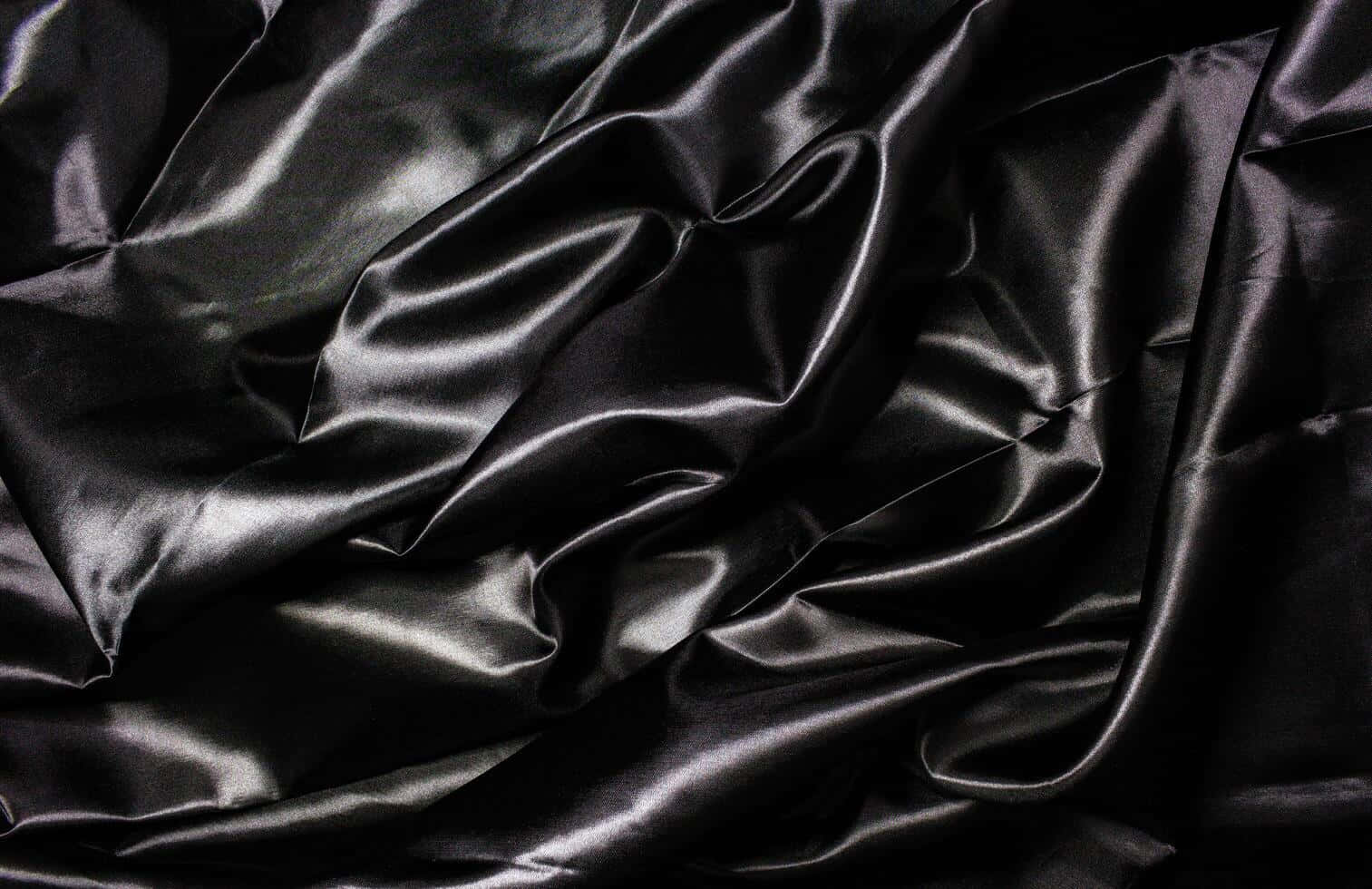 Elegant Black Silk Texture Background