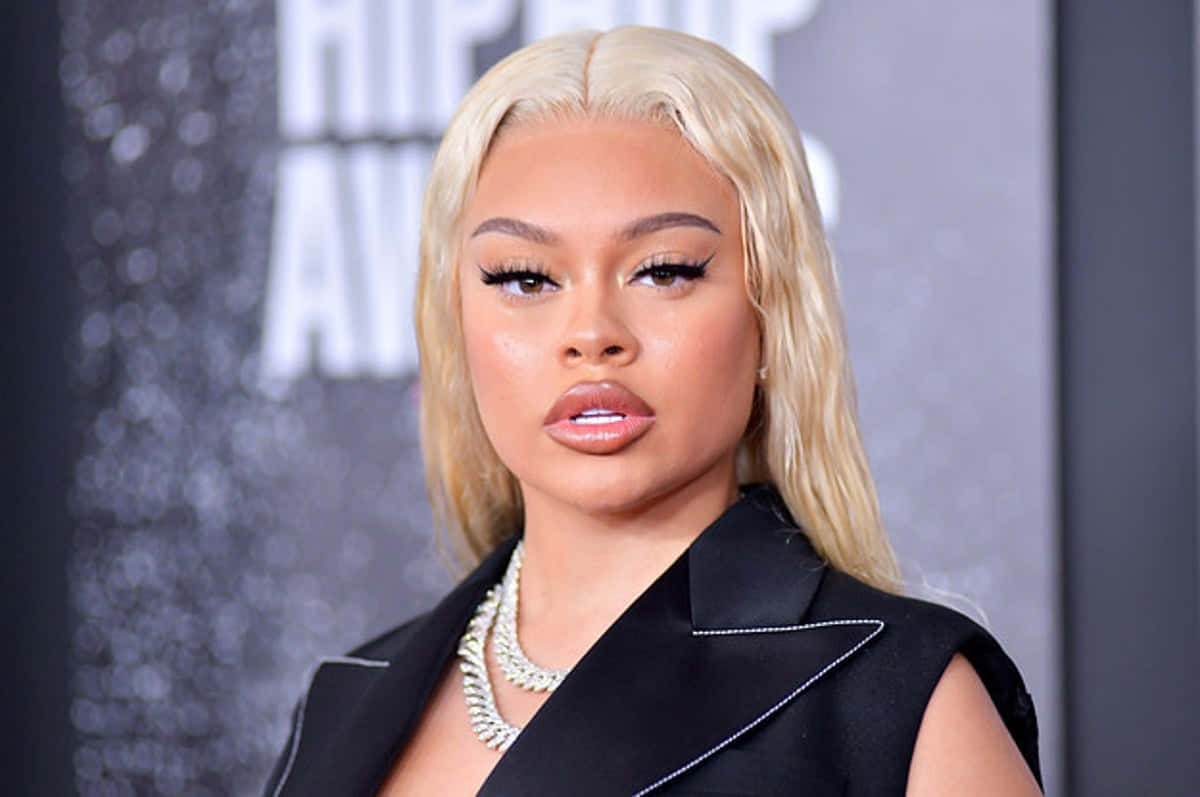 Elegant Blonde Woman Red Carpet Look Background