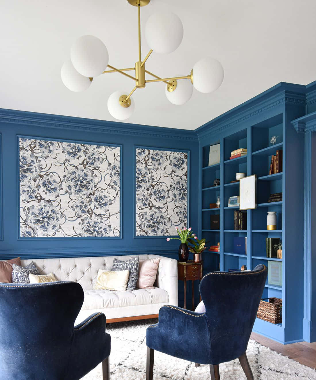 Elegant Blue Living Roomwith Modern Pendant Light Background