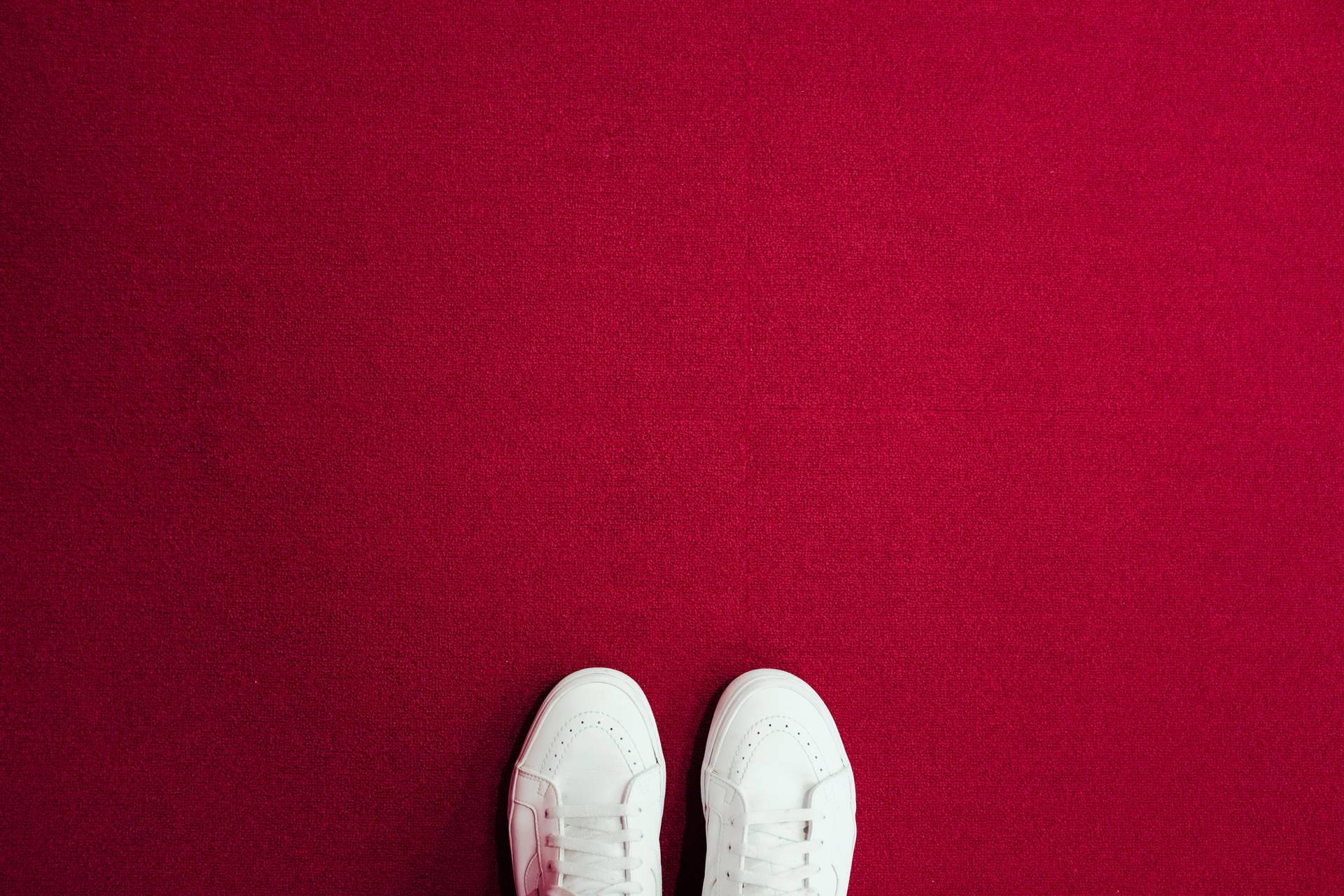 Elegant Celebrity Walking The Extravagant Red Carpet Background