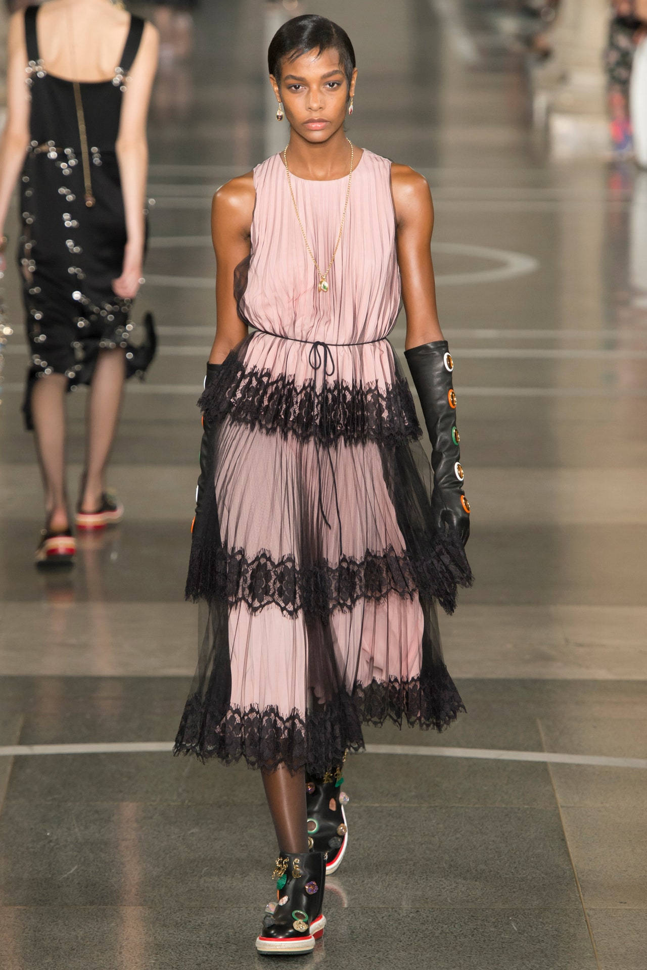 Elegant Christopher Kane Pink And Black Frill Dress Background