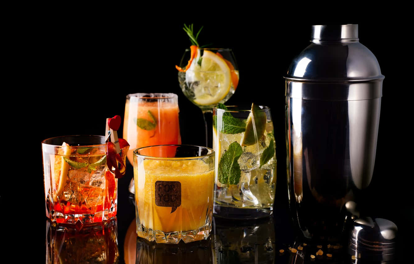 Elegant Cocktail Drinks Illuminated On Dark Background Background