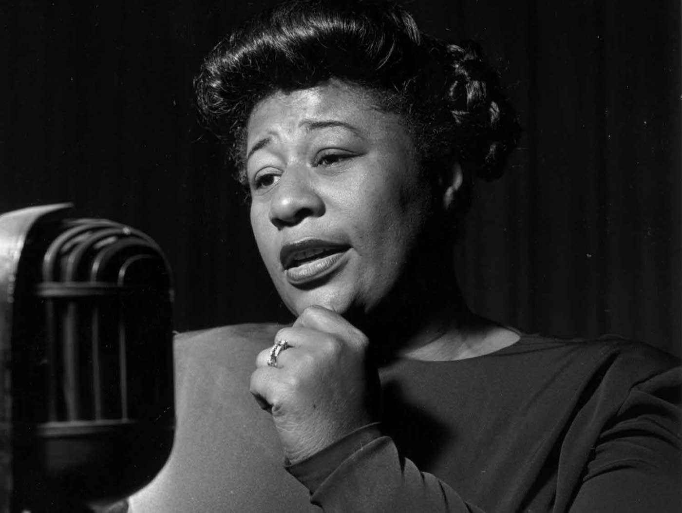 Elegant Ella Fitzgerald In Long Sleeves Background