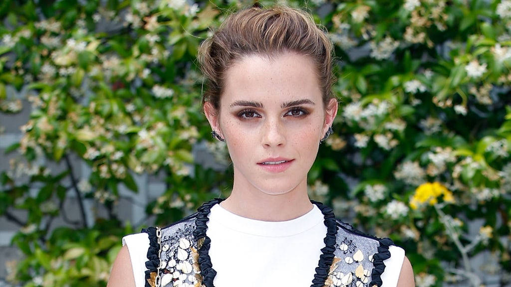Elegant Emma Watson At A Red Carpet Event Background