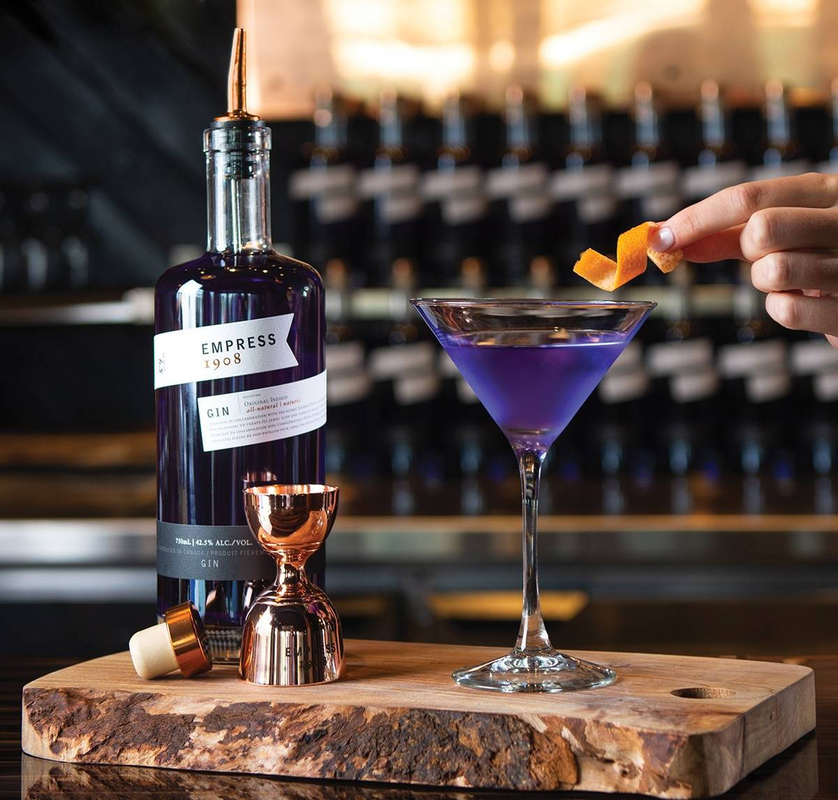 Elegant Empress 1908 Gin Served With A Martini Glass Background