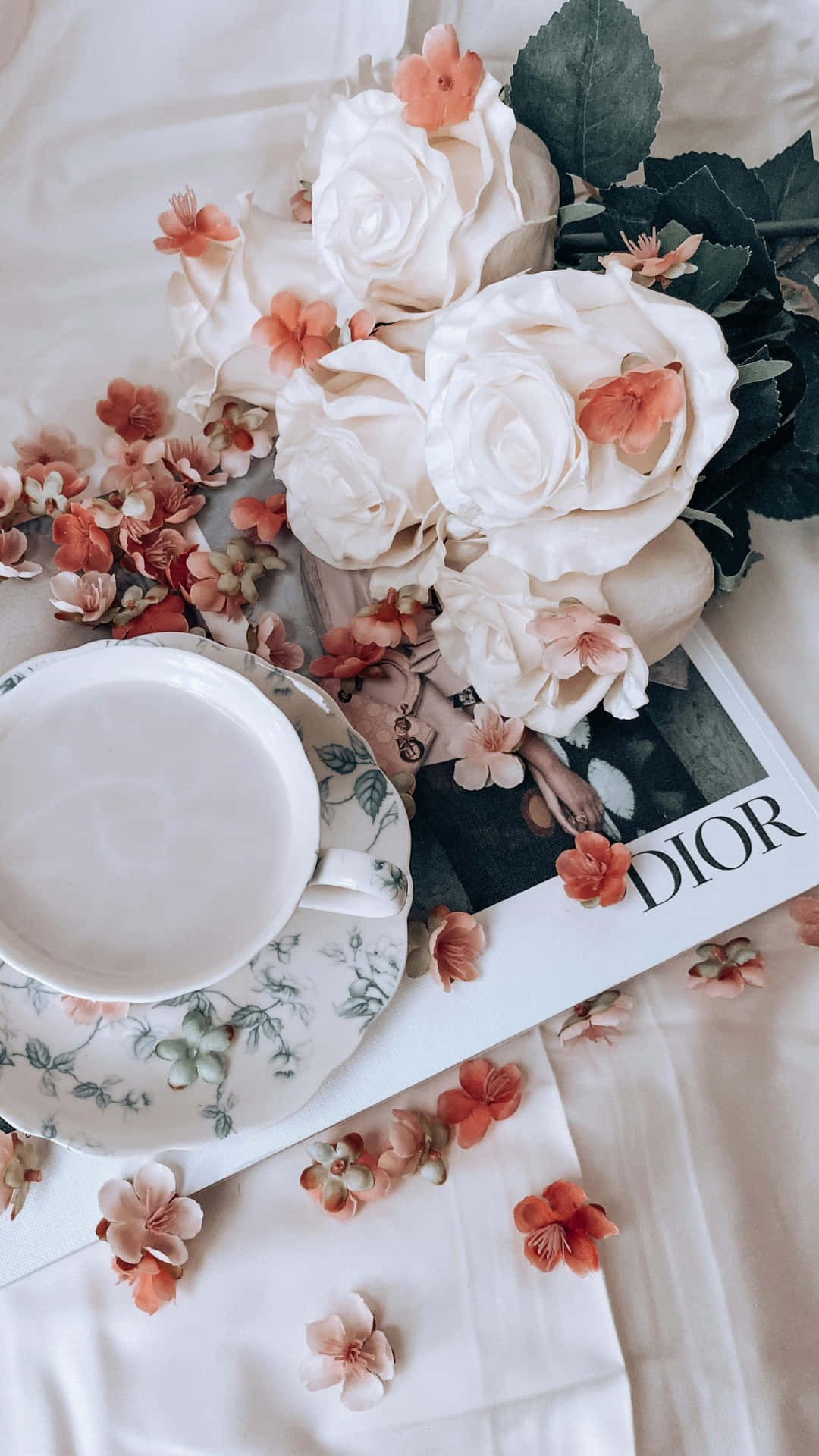 Elegant Floral Tea Time With Dior Magazine Background