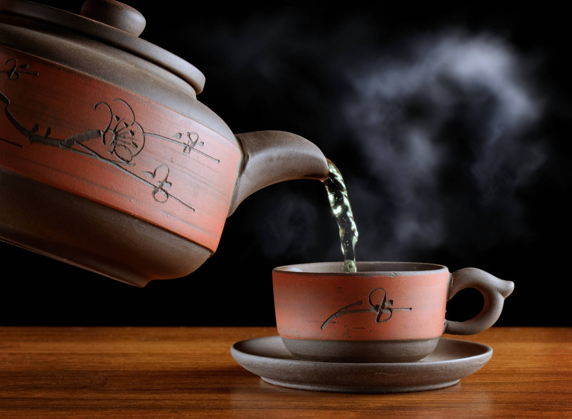 Elegant Hot Tea Pot Brewing Tranquility Background