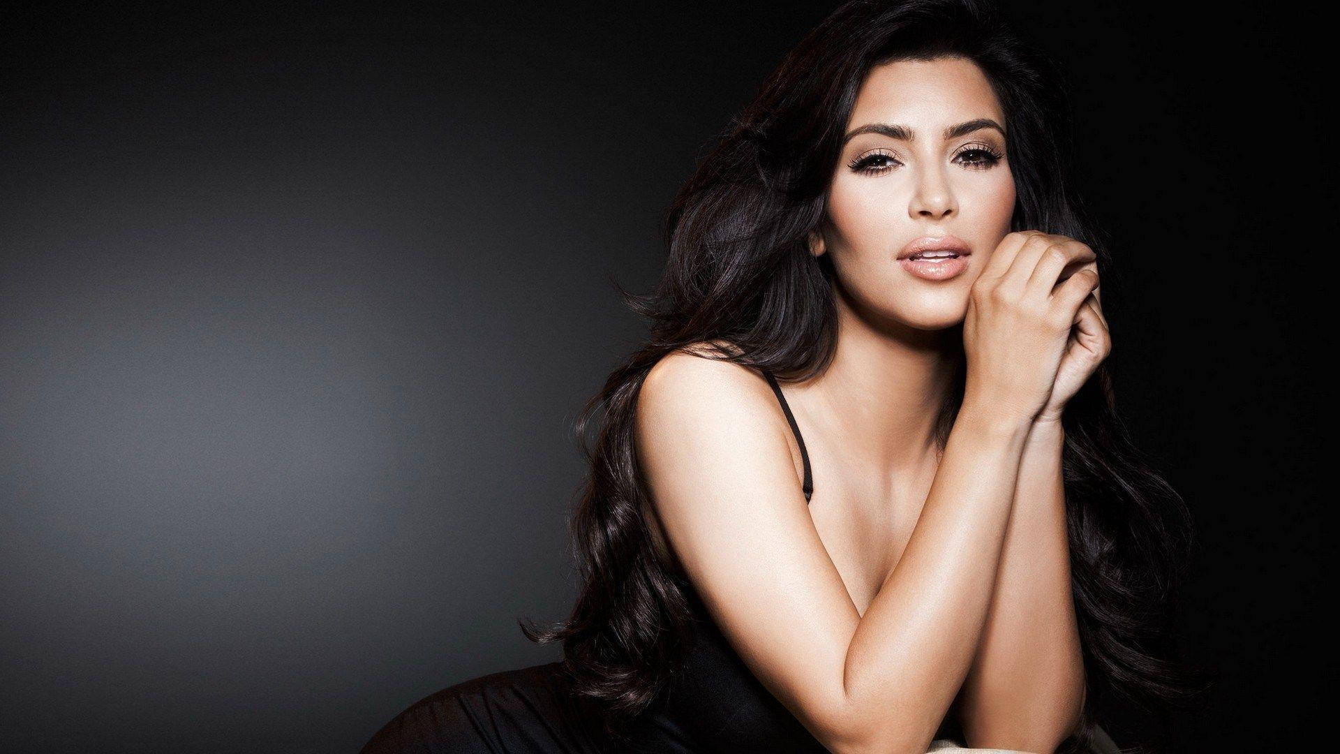 Elegant Kim Kardashian Poses In The Dark Background