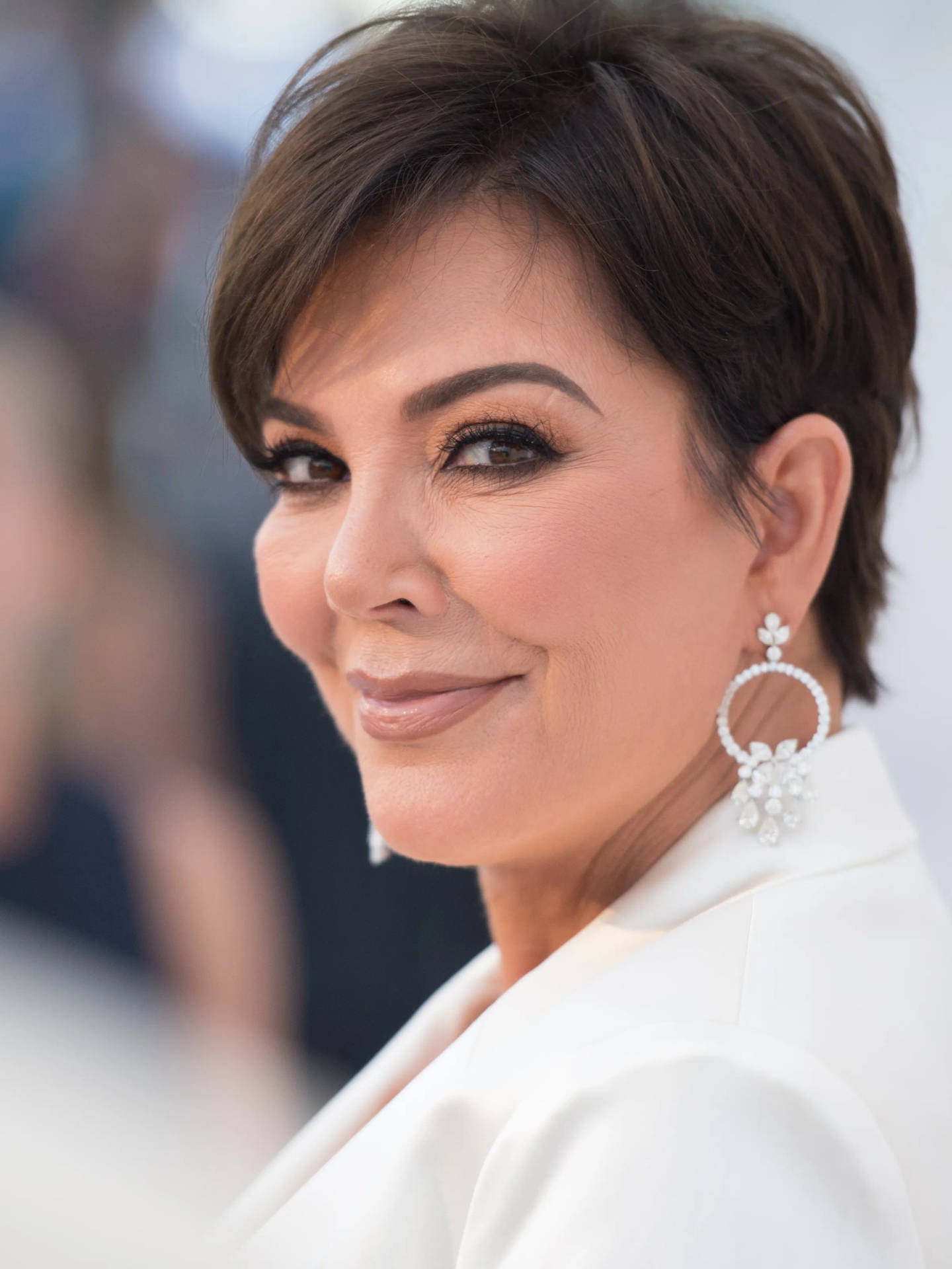 Elegant Kris Jenner In Profile View Background