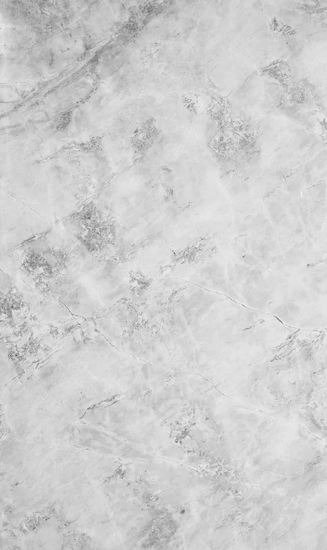 Elegant Marble Macbook On A Stylish Workspace Background