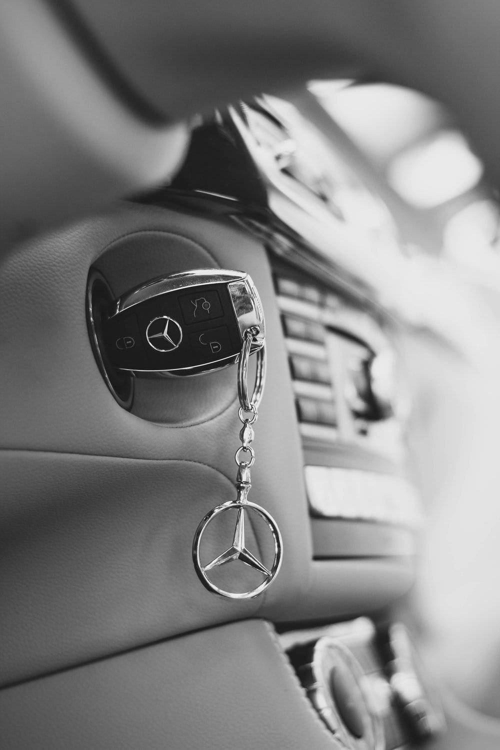 Elegant Mercedes-benz Car Key In Black And White Background