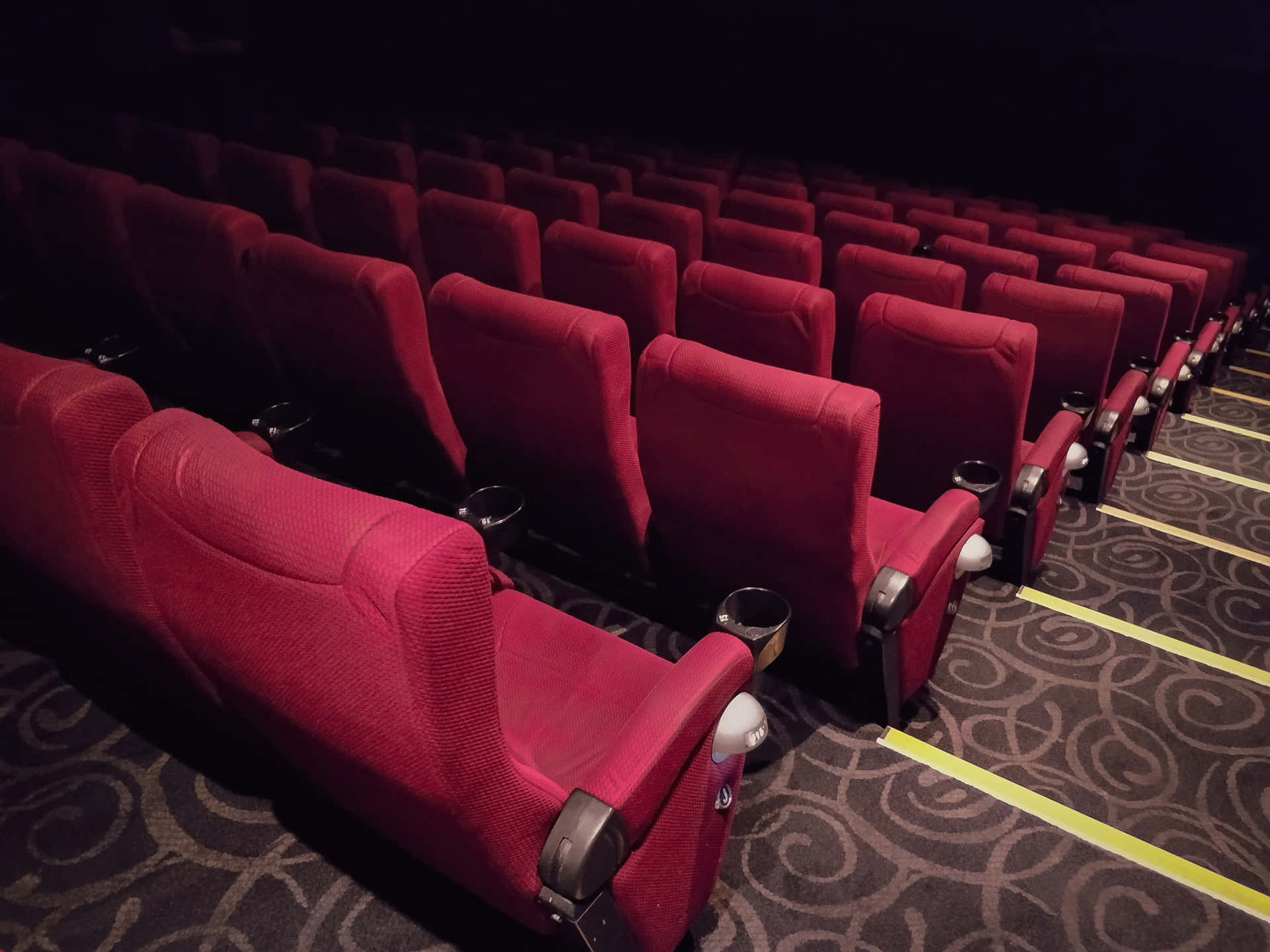 Elegant Movie Theater With Red Chairs