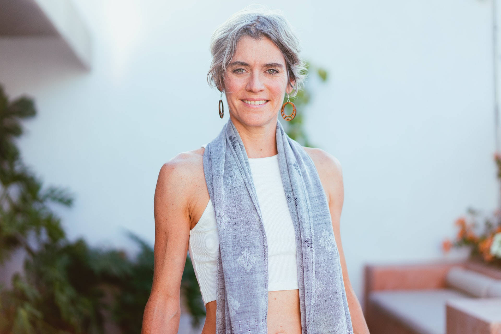 Elegant Older Woman In A Decorative Scarf