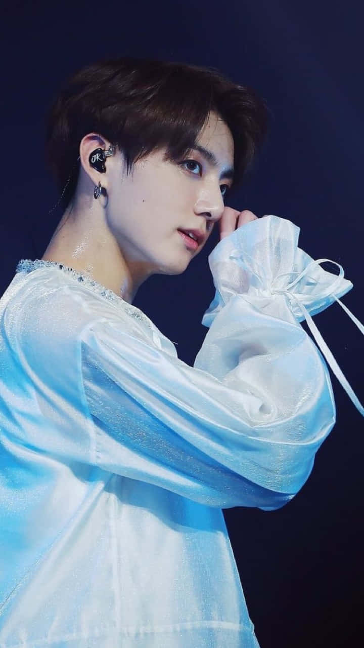 Elegant_ Performer_in_ Blue Background