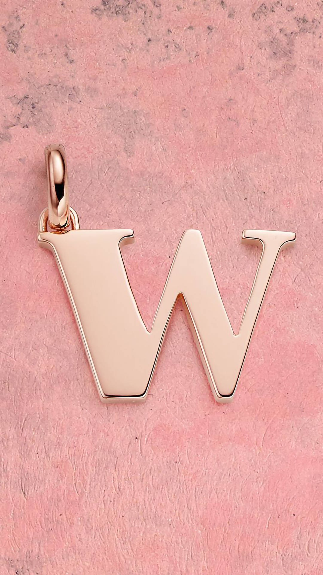 Elegant Pink Pendant In The Shape Of Letter W Background