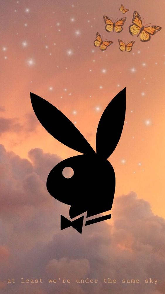 Elegant Playboy Bunny In Sparkling Costume Background