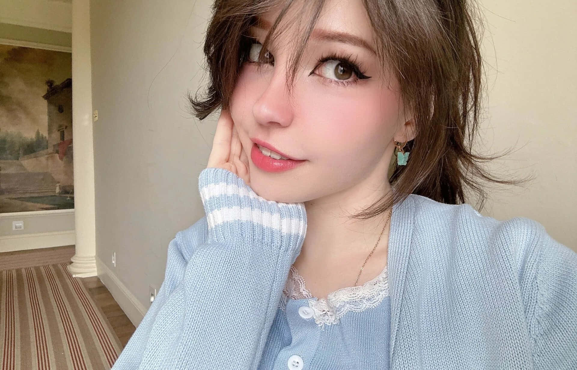 Elegant Portraitin Blue Cardigan