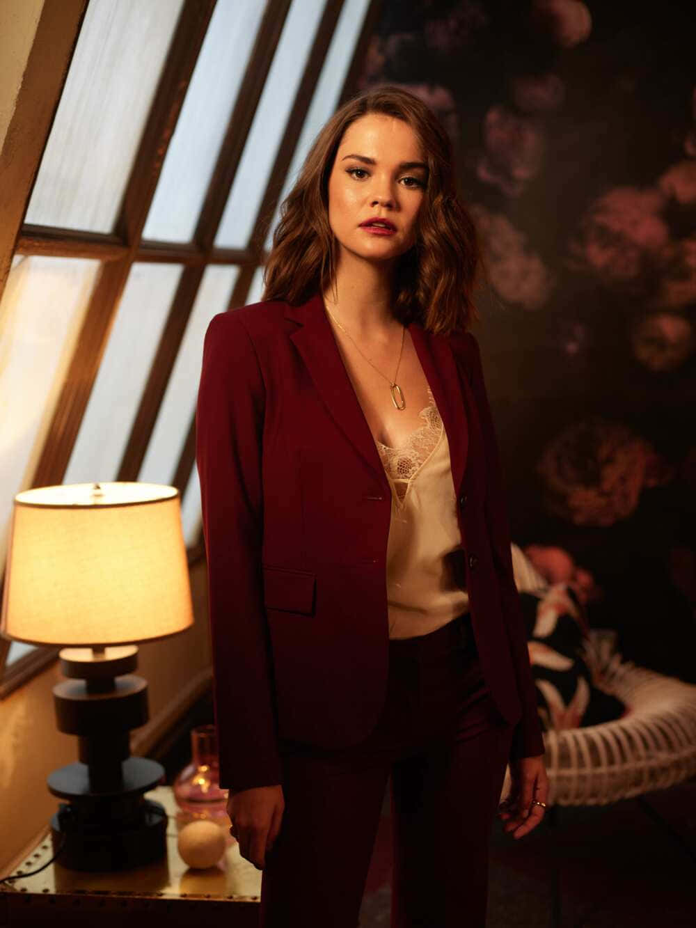 Elegant Portraitin Burgundy Blazer Background